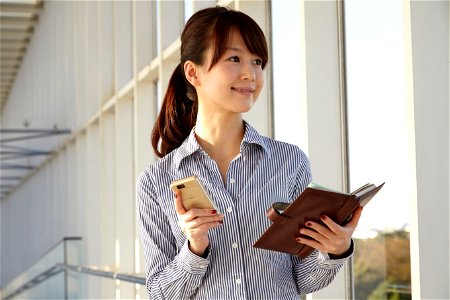 Businesswoman Smartphone Notebook