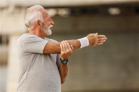 Senior Man Fitness Stretch photo