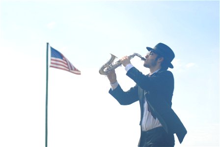 Man Play Saxophone photo