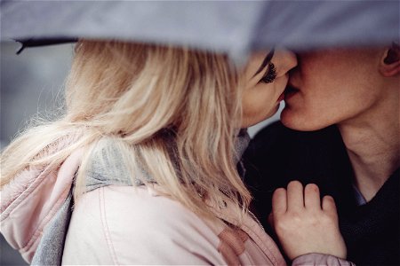 Couple Kiss Umbrella photo