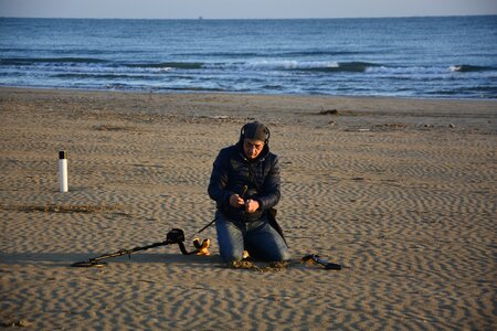 Beach man treasure hunter