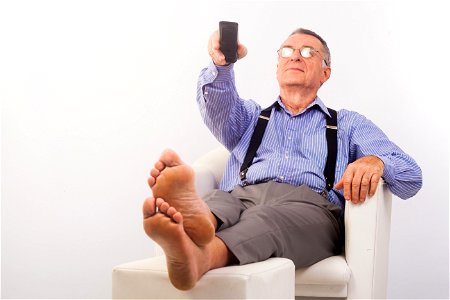 Senior Man Watching Tv photo