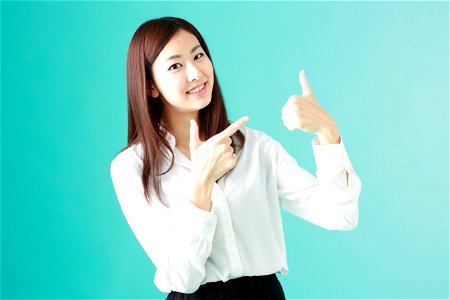 Business Woman Thumbs Up photo