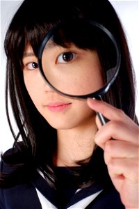 Female Student Magnifying Glass
