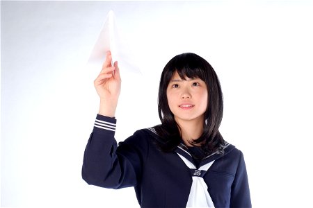 Female Student Paper Airplane photo