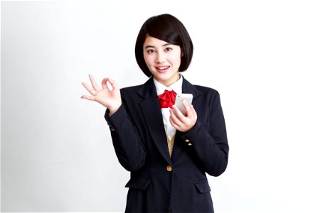 Female Student Ok Sign photo