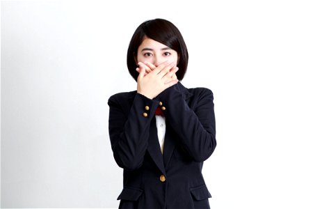 Female Student Cover Mouth