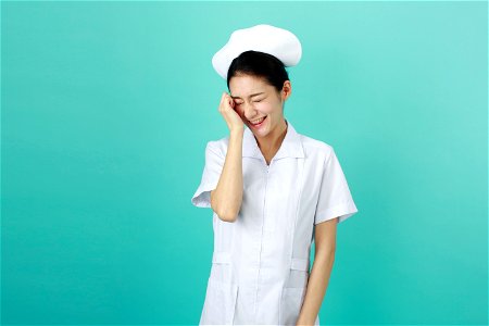 Woman Nurse Shy photo