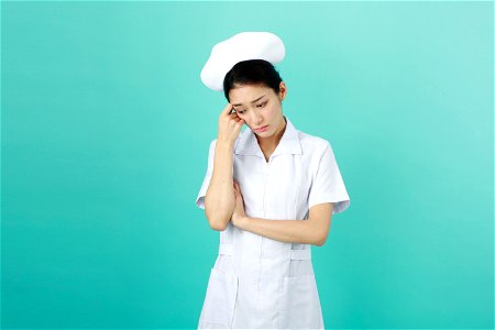 Woman Nurse Worry photo