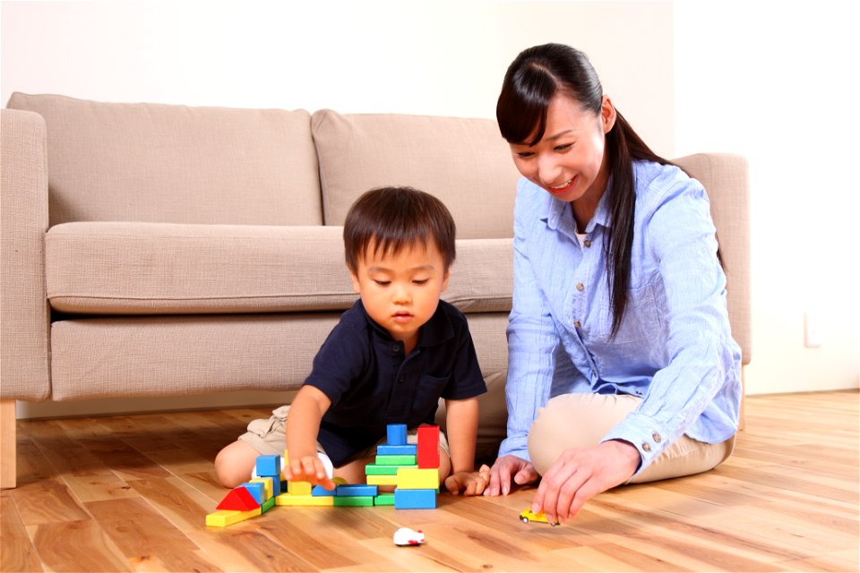 Mother Son Playing Toy Block photo