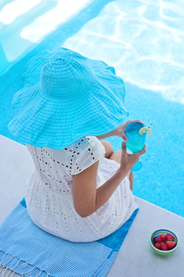 Woman turquoise water