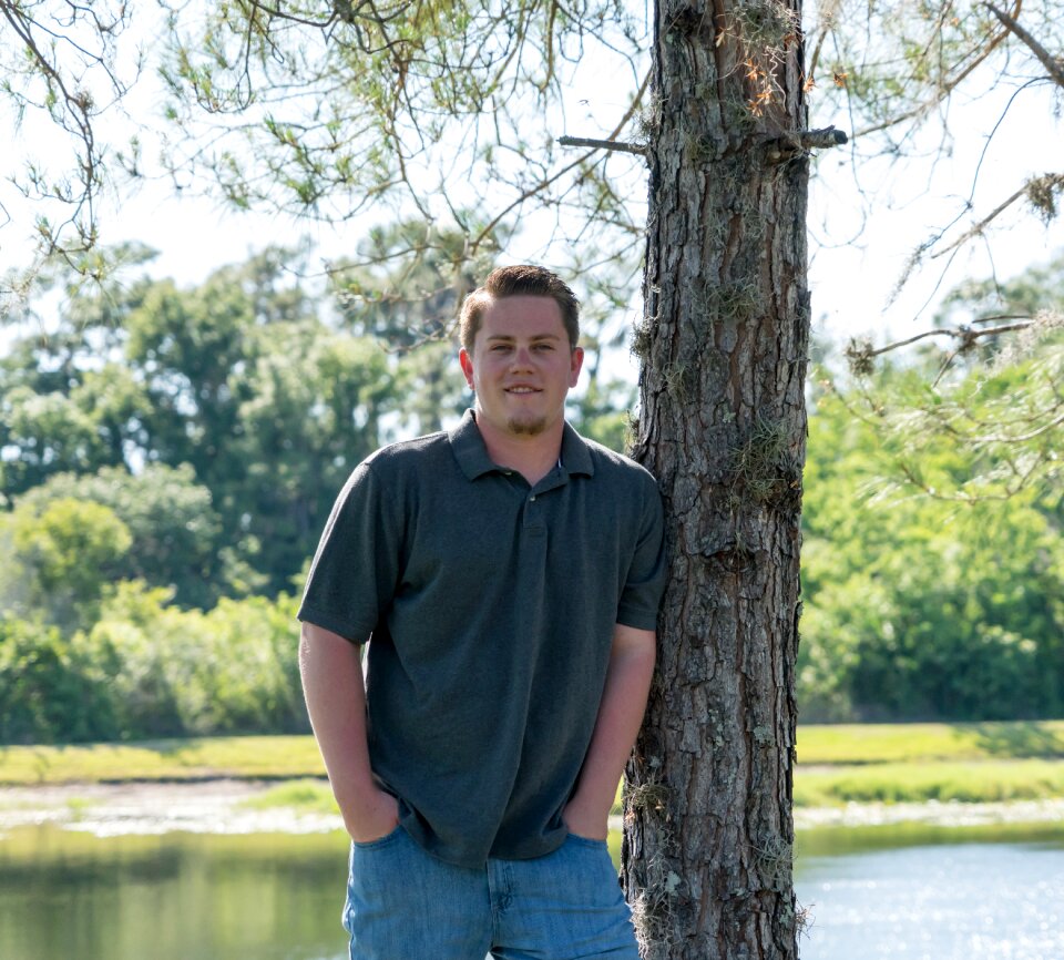 Young man nature tree