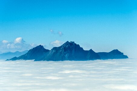 Mountains switzerland sea of fog photo