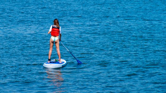 Body surfing stand up paddle photo