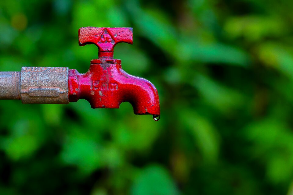 Save water drop from tap water green water