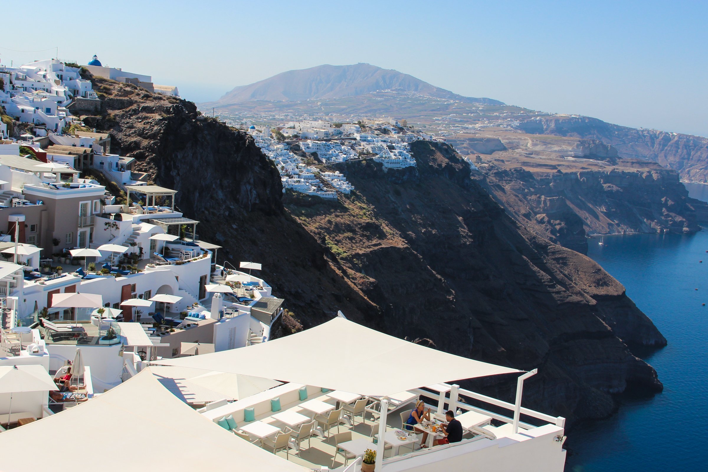 Cliff Resorts And Buildings In Santorini Island photo