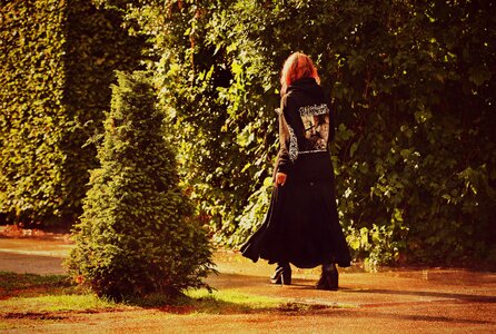 Red hair walking path photo