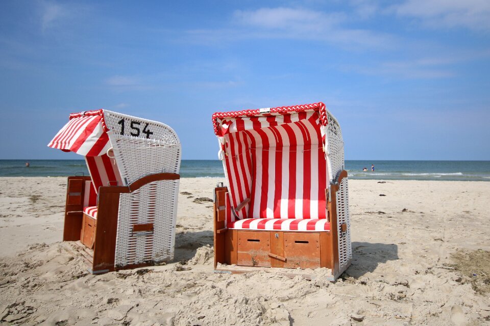 Beach chair sand beach sea photo