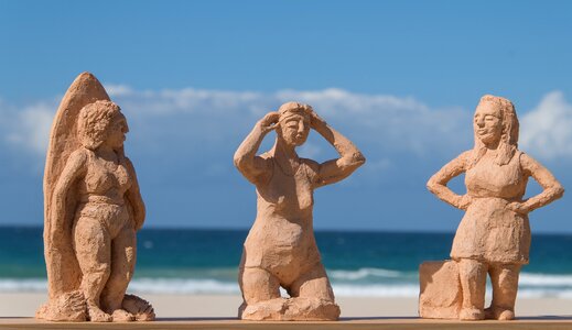 Sculpture art swimmers photo