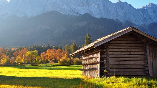 Autumn colours hut alpine hut photo