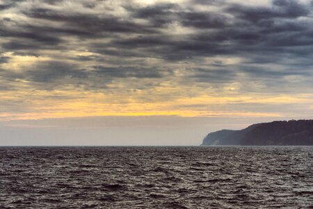 Clouds land distant photo