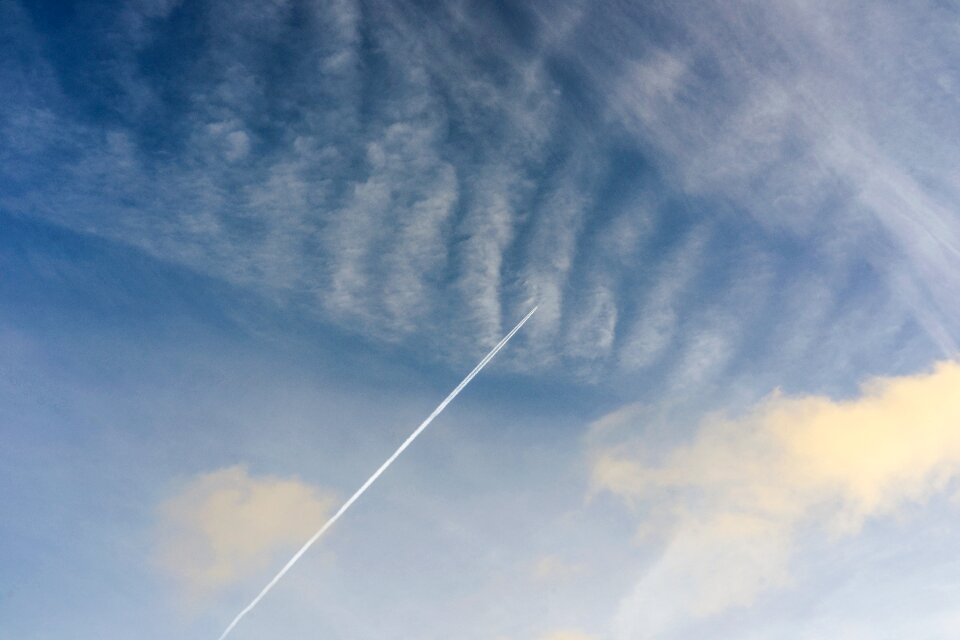 Chem trails trail clouds