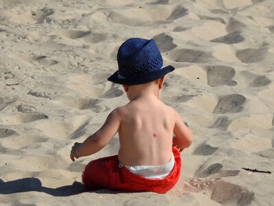 Sand a small child boy photo