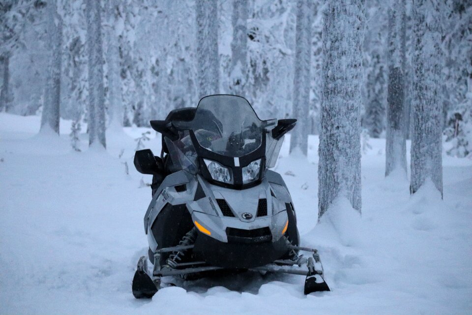 Winter snowmobile sledding