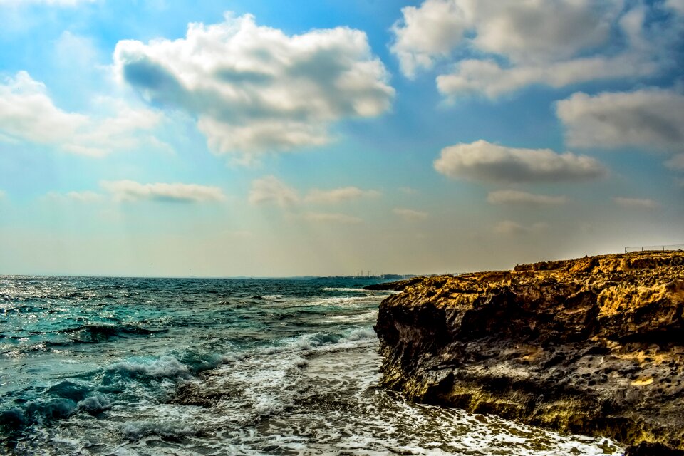 Clouds horizon waves photo