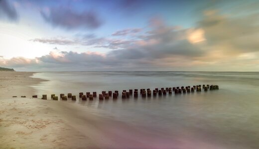 Wooden ocean sunrise over the sea