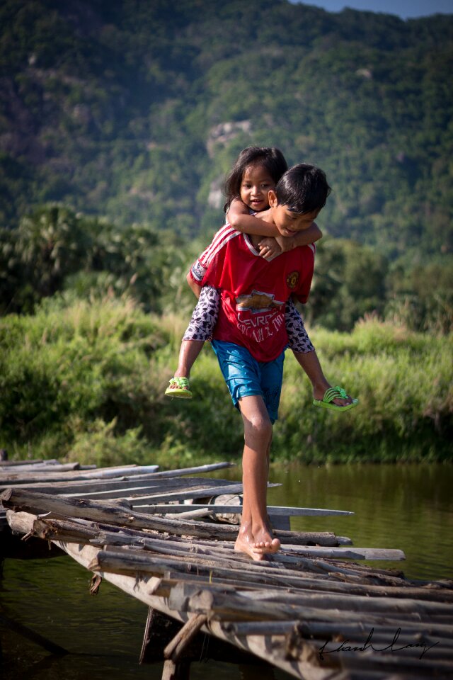 Brother piggyback children