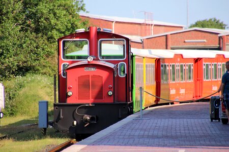 Red locomotive railway station inselzug