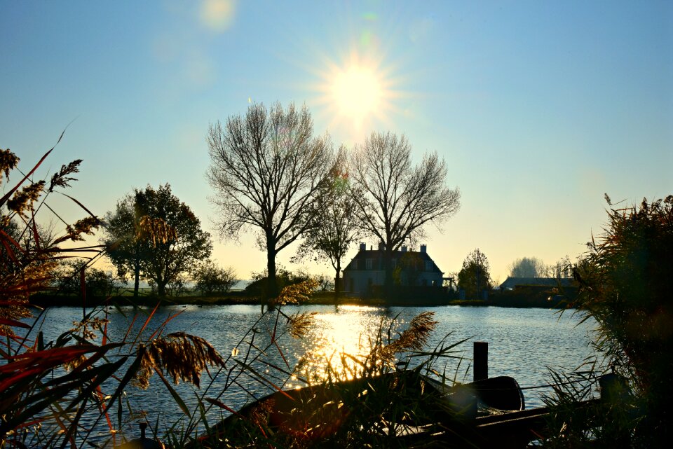 Reeds row boat farm house