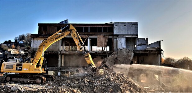 Building rubble water jet construction dust photo