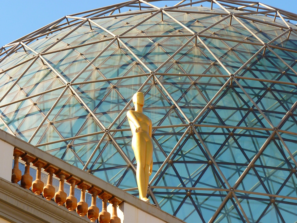 Glass dome figure golden
