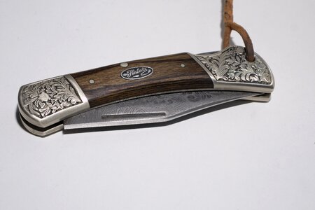 Equipment pocket knife cut