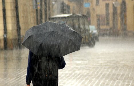 The downpour walk in the rain man photo