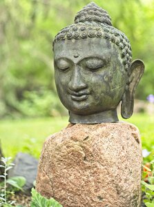 Face garden sculpture