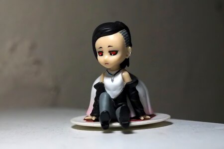 Sit toy figurine photo