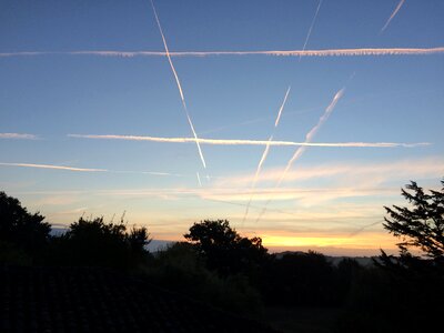 Dawn morning vapor trails