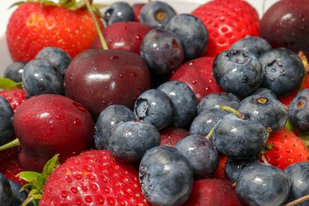 Fresh cherries strawberries photo