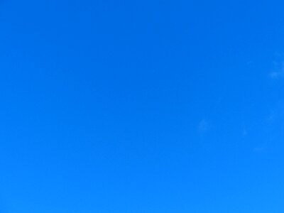 Partly cloudy blue background