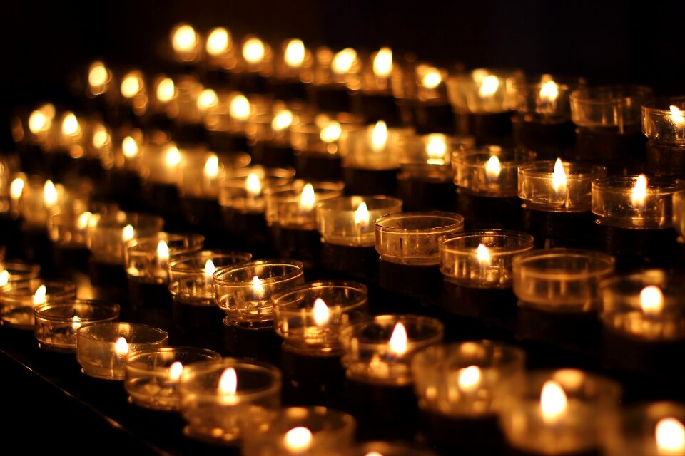 Prayer lights victim candles