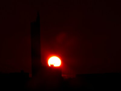 Sunset grain silo schapfe mill photo