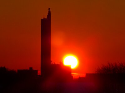 Sunset grain silo schapfe mill photo