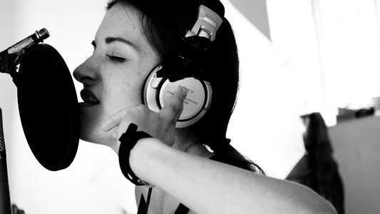 Headphones girl singing photo