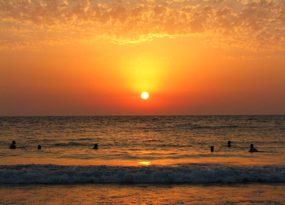 People swim ocean