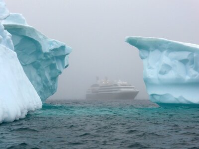 Ice floes cruise ship foggy photo