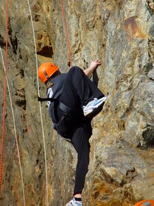 Climber climbing man