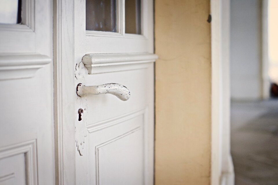 Old white door handle